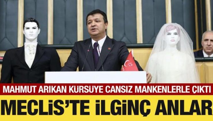 Meclis’te ilginç anlar: Mahmut Arıkan kürsüye gelin ve damat mankeniyle çıktı